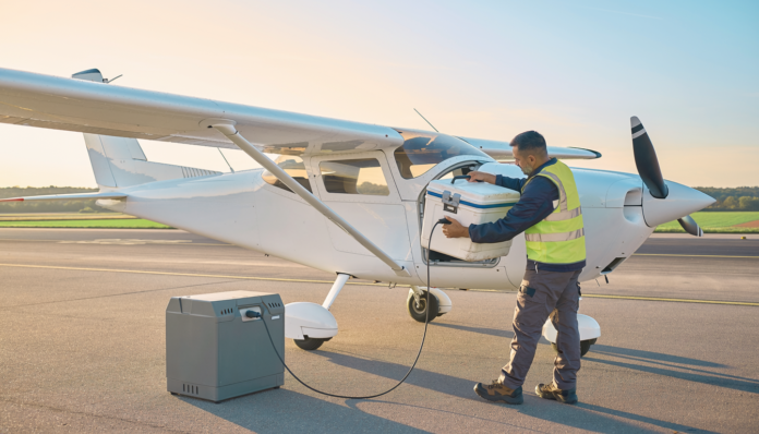 Firefly photograph of a small electric fixed wing aircraft in plain unmarked white livery wit 609204
